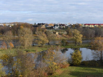 View of the new real estate development on the Russian side, and the fishing activities at the border river and its island. Even the coat of arms of Narva has 2 fish on it, pointing to the abundance of fish in the river and the importance of fishing in the local daily lives.