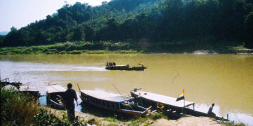 The social dynamics of a borderland river